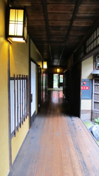 Looking down the hall, you can see that the long yellow section reflects what the light is bringing in at the other end. The whole length is polished. This is "ohtsu-migaki," a polished lime-clay, about 20-30 percent lime, with hemp fibers. The finish layer is the thickness of a fingernail.